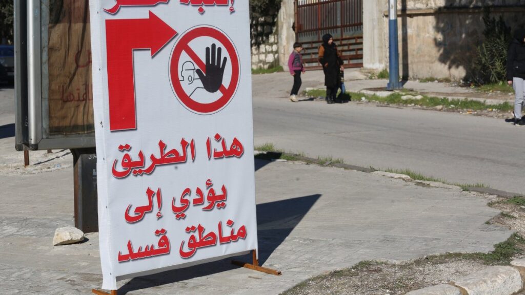 A sign warns people against entering a YPG-controlled neighborhood, Aleppo, Syria, Feb. 20, 2025. (AA Photo)