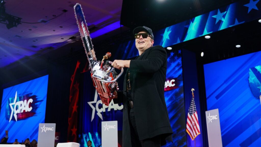 U.S. special government employee Elon Musk with a chainsaw given to him by Argentine President Javier Milei at the Conservative Political Action Conference (CPAC) 2025 at National Harbor, Maryland, Feb. 20, 2025. (EPA Photo)