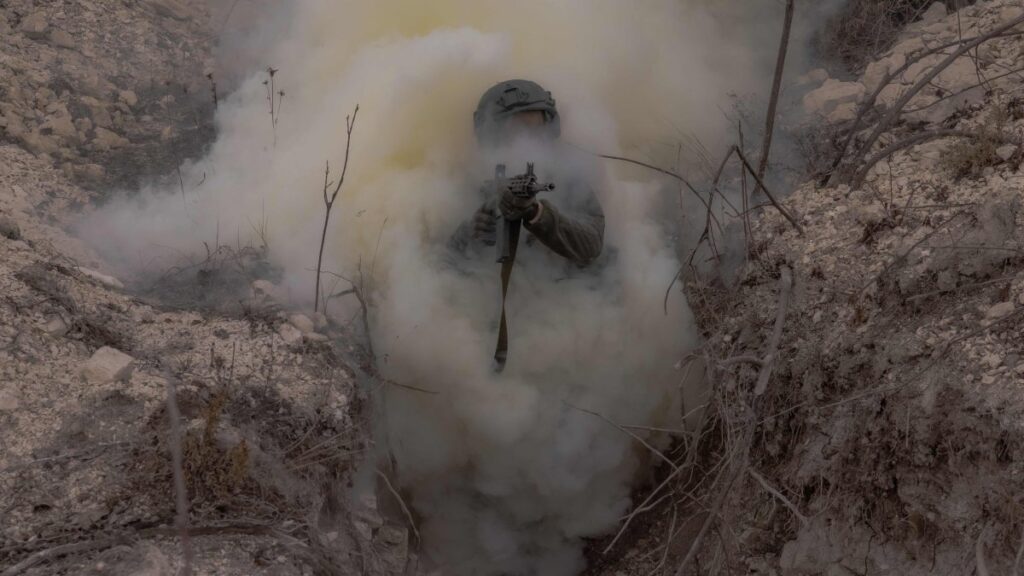 A Ukrainian serviceman moves through a trench during a military training exercise in the eastern Donetsk region, Ukraine, Feb. 3, 2025. (AFP Photo)