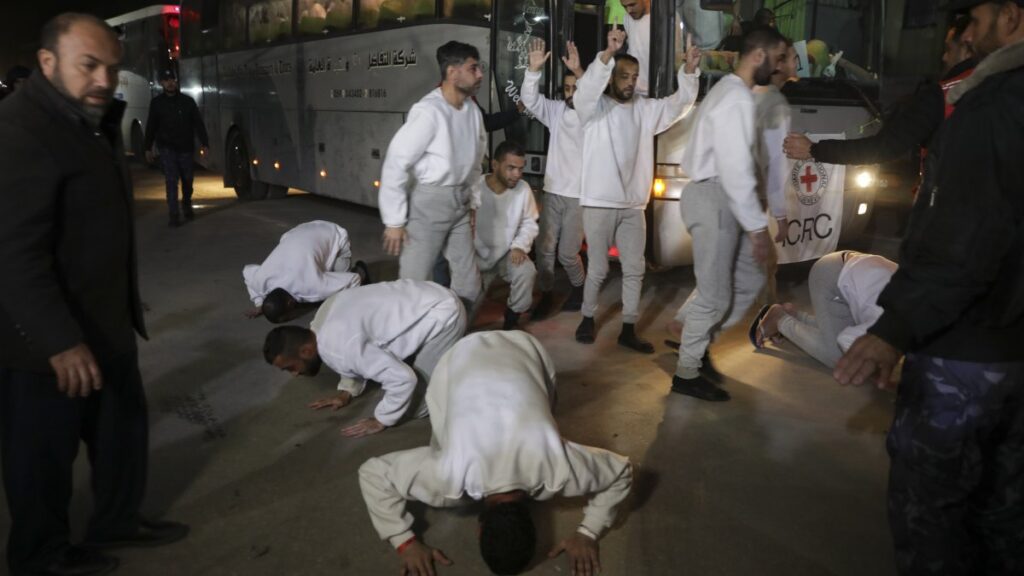 Freed Palestinian prisoners react as they arrive in the Gaza Strip after being released from an Israeli prison following a ceasefire agreement between Hamas and Israel in Khan Younis, Gaza Strip, Thursday, Feb. 27, 2025. (AP Photo/Jehad Alshrafi)