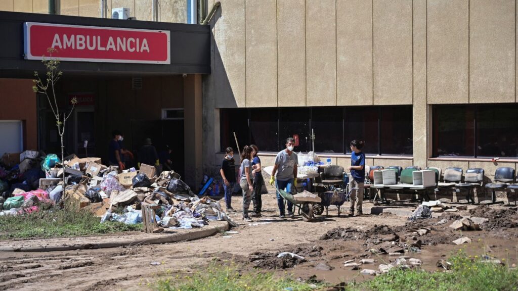 People clean up outside the Jose Penna Interzonal Hospital after a flood struck the city of Bahia Blanca, Argentina, March 9, 2025. (Reuters Photo)
