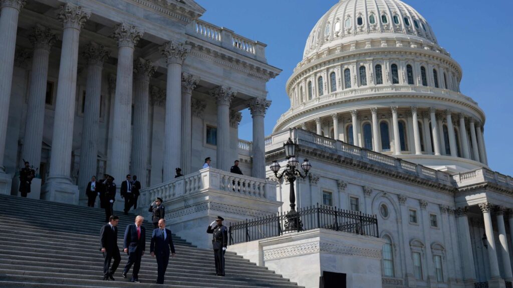 A general view as (L-R) House Speaker Mike Johnson, U.S. President Donald Trump and Irish Taoiseach Micheal Martin depart the U.S. Capitol following a "Friends of Ireland" luncheon, Washington, U.S., March 12, 2025 (Getty Images via AFP Photo)
