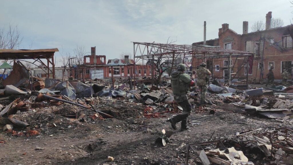Russian soldiers operate among destruction in the town of Sudzha in the Kursk region, Russia, March 13, 2025. (AFP Photo)