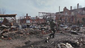 Russian soldiers operate among destruction in the town of Sudzha in the Kursk region, Russia, March 13, 2025. (AFP Photo)