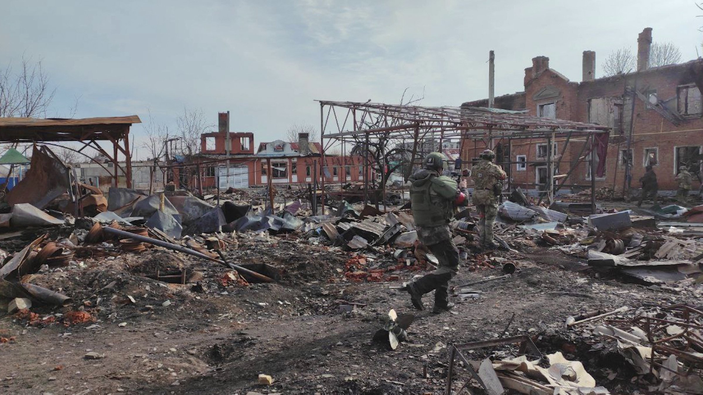 Russian soldiers operate among destruction in the town of Sudzha in the Kursk region, Russia, March 13, 2025. (AFP Photo)