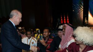 President Recep Tayyip Erdoğan shakes hands with international guests at the event, Ankara, Türkiye, March 13, 2025. (AA Photo)