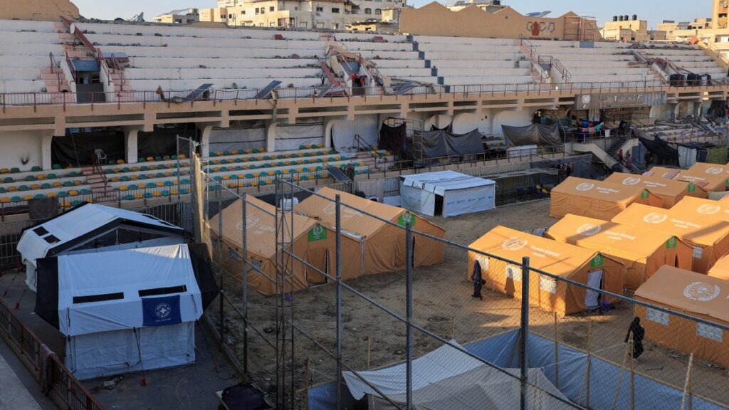 Displaced Palestinians take shelter in a tent camp set up at Palestine Stadium, which was damaged during the Israeli offensive, Gaza City, Palestine, March 11, 2025. (Reuters Photo)