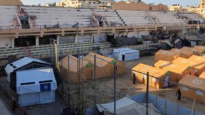 Displaced Palestinians take shelter in a tent camp set up at Palestine Stadium, which was damaged during the Israeli offensive, Gaza City, Palestine, March 11, 2025. (Reuters Photo)