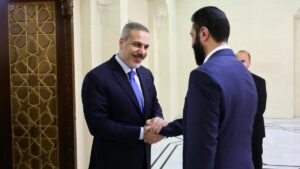 Turkish Foreign Minister Hakan Fidan (L) is welcomed by Syria's interim President Ahmed al-Sharaa (R), Damascus, Syria, March 13, 2025. (AFP Photo)