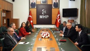 The Peoples’ Equality and Democracy Party (DEM Party) delegation (L) meets Nationalist Movement Party (MHP) deputy chairs at the MHP's offices at Parliament, Ankara, Türkiye, March 17, 2025. (AA Photo)