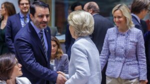 Syria's Foreign Minister Asaad Hassan al-Shaibani (L) is welcomed by European Commission President Ursula von der Leyen (C), at the EU conference on Syria  in Brussels, Belgium, March 17, 2025. (EPA Photo)