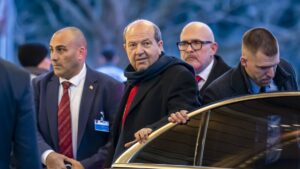 TRNC President Ersin Tatar (C) arrives at the Intercontinental Hotel for a dinner during the informal 5-plus-1 meeting on Cyprus, Geneva, Switzerland, March 17, 2025. (EPA Photo)