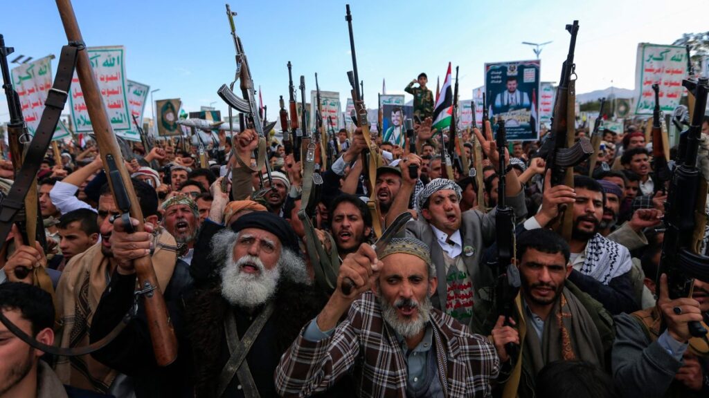 Yemenis brandish rifles and chant during a demonstration called for by the rebel Houthi movement in Sanaa, Yemen, March 17, 2025. (AFP Photo)