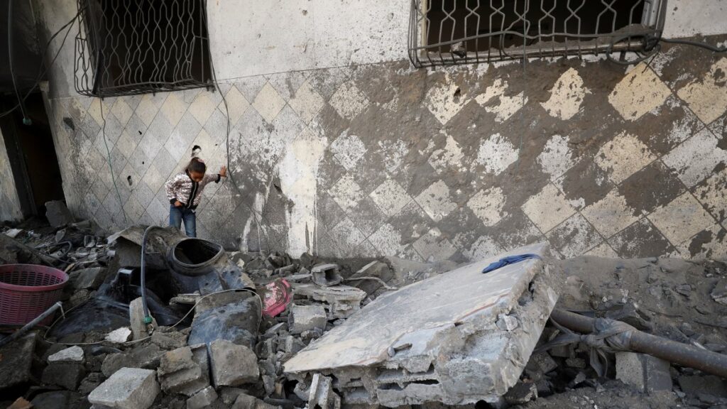 A Palestinian child stands at the site of an Israeli strike on a residential building in Jabalia in the northern Gaza Strip, Palestine, March 18, 2025. (Reuters Photo)