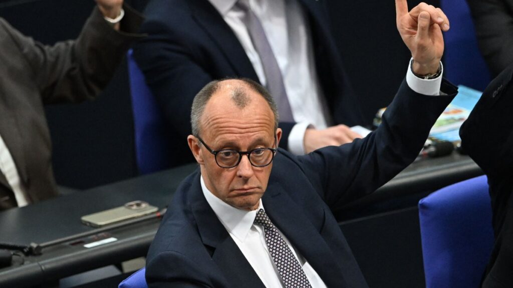 Friedrich Merz, leader of Germany's conservative Christian Democratic Union (CDU) party, raises his hand during a vote at a session of the Bundestag (lower house of parliament) in Berlin, Germany, March 18, 2025. (AFP Photo)