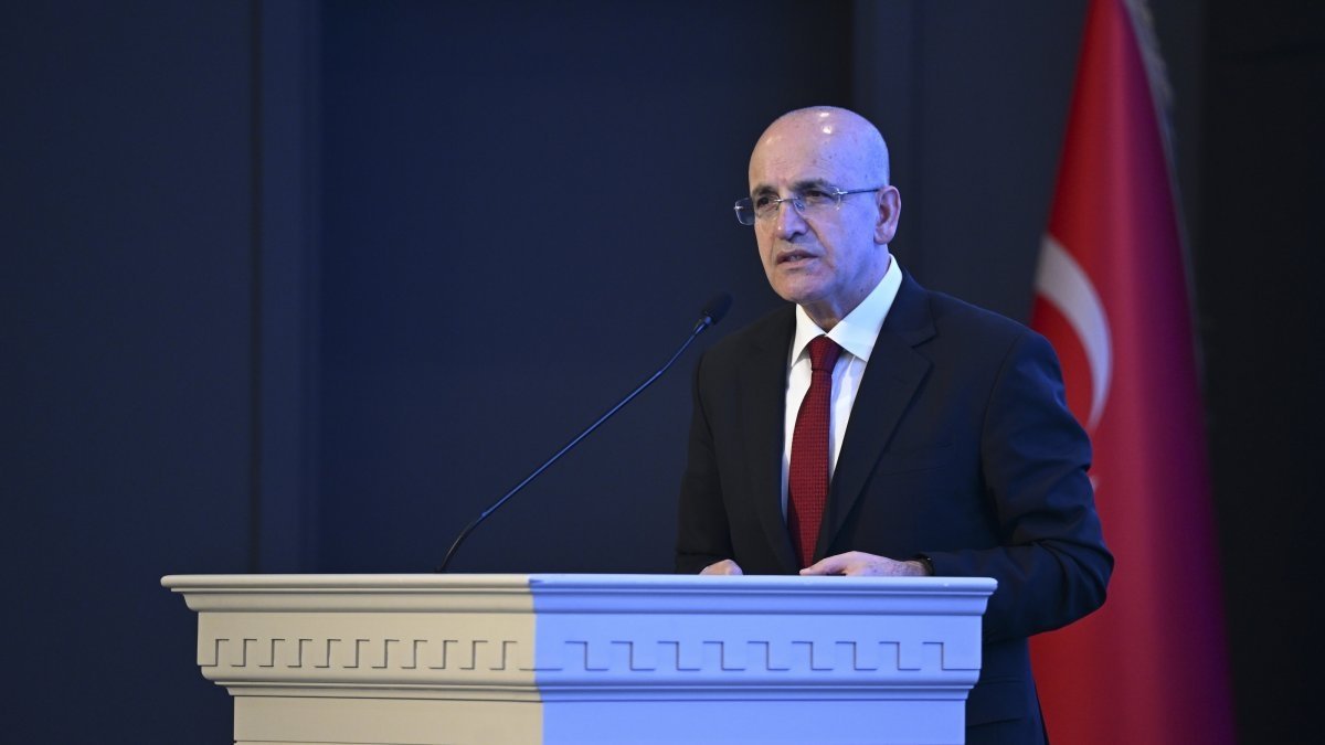 Treasury and Finance Minister Mehmet Şimşek delivers a speech at an event, Istanbul, Türkiye, Jan. 8, 2025. (AA Photo)