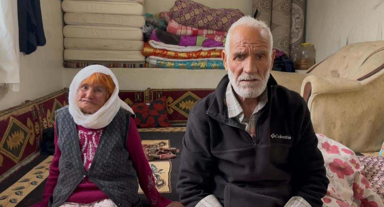 Fatma Akyüz, who has lived without an official identity for 70 years, sits beside her husband, Faruk Akyüz, in their home, Suruç, Şanlıurfa, southeastern Türkiye, March 24, 2025. (IHA Photo)