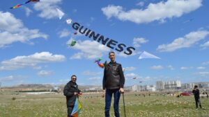 Sultan Kösen, the world's tallest living man, joyfully participates in a kite festival, Mardin, Türkiye, April 7, 2025. (DHA Photo)