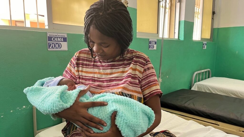 A new mother poses after giving birth to a son in Luanda, Angola, April 30, 2024. (Getty Images)