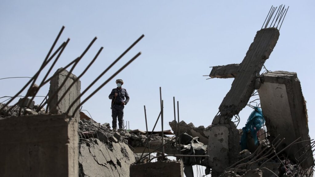 In this file photo, a man inspects a damaged building after a U.S. airstrike in Sana'a, Yemen, April 7, 2025. (EPA Photo)