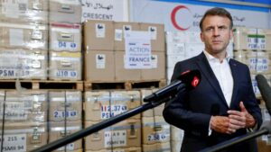 French President Emmanuel Macron talks to media during a visit to Egyptian Red Crescent warehouses storing aid for Gaza, in the Egyptian border town of el-Arish, Egypt, April 8, 2025. (AFP Photo)