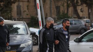 Palestinian Ahmed Manasra (C), released earlier in the day from an Israeli jail, leaves an Israeli security office accompanied by his father in Jerusalem, April 10, 2025. (AFP Photo)