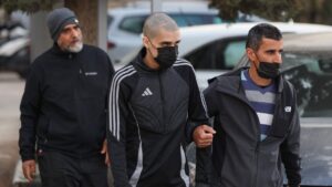 Palestinian Ahmed Manasra (C), released earlier in the day from an Israeli jail, leaves an Israeli security office accompanied by his father (R), East Jerusalem, occupied Palestine, April 10, 2025. (AFP Photo)