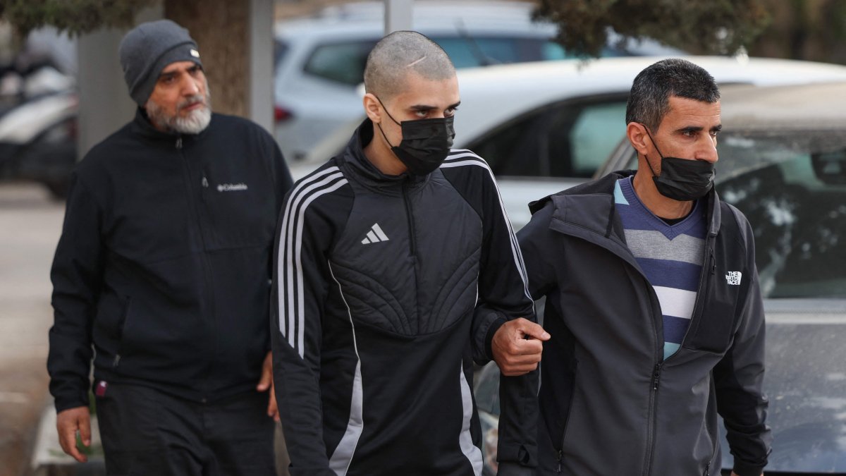 Palestinian Ahmed Manasra (C), released earlier in the day from an Israeli jail, leaves an Israeli security office accompanied by his father (R), East Jerusalem, occupied Palestine, April 10, 2025. (AFP Photo)