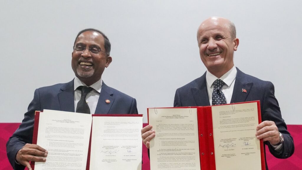 Council of Higher Education President Professor Erol Özvar (R) and Malaysian Minister of Higher Education Zambry Abdul Kadir hold copies of the signed Joint Commission Meeting agreement, Istanbul, Türkiye, April 8, 2025. (Courtesy of Minister Zambry Abdul Kadir)
