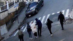 In this image taken from security camera video, Rümeysa Öztürk, a 30-year-old doctoral student at Tufts University, is detained by Department of Homeland Security agents on a street in Sommerville, Mass., U.S., March 25, 2025. (AP Photo)