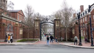 People in front of the main gate to Harvard Yard, in Cambridge, Massachusetts, U.S., April 15, 2025. (AFP Photo)