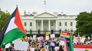 Demostrators rally during the nationwide "Hands Off!" protest against U.S. President Donald Trump's policies and executive actions, near the White House in Washington, D.C., U.S., April 19, 2025. (AFP Photo)