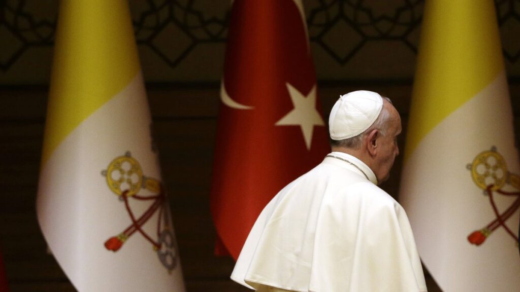 Pope Francis leaves at the end of his speech during a meeting with President Recep Tayyip Erdoğan, Ankara, Türkiye, Nov. 28, 2014. (AP Photo)
