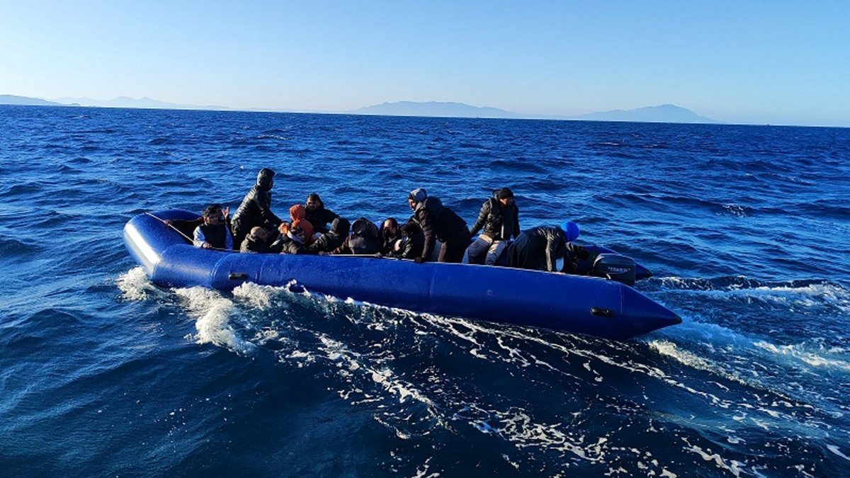 A group of migrants attempting to cross into Greece is caught on a rubber boat off the coast of western Izmir province, Türkiye, April 14, 2025. (AA Photo)