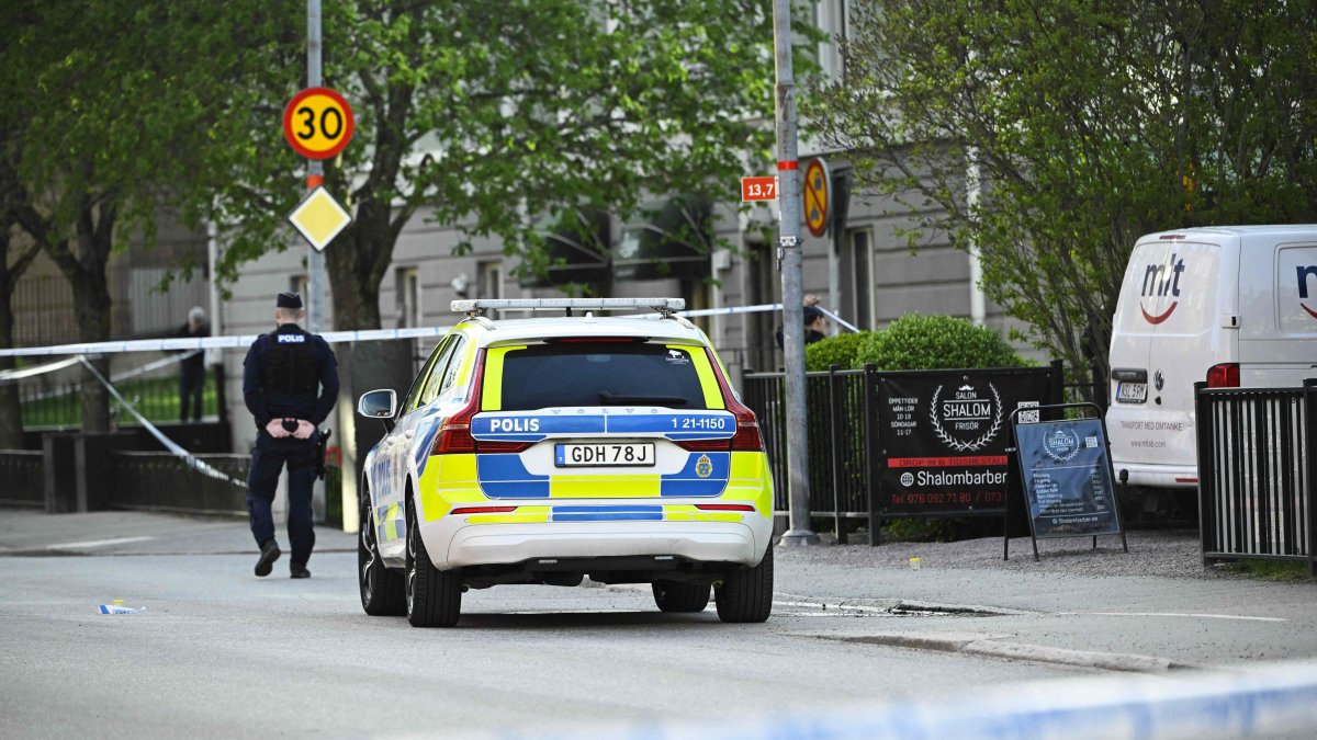 Police officers cordon off the scene after several people were killed in a shooting at Vaksala Square in central Uppsala, Sweden, April 29, 2025. (AFP Photo)