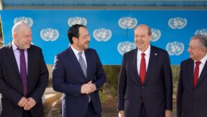 TRNC President Ersin Tatar (C-R) and the Greek Cypriot community head Nikos Christodoulides (C-L) pose at a meeting in the U.N. buffer zone, Lefkoşa (Nicosia), island of Cyprus, April 2, 2025. (AFP Photo)