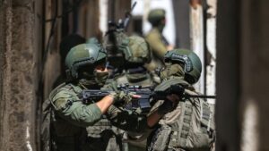 Israeli soldiers take a position during a raid in the Al-ain camp for Palestinian refugees west of Nablus in the occupied West Bank, Palestine, April 28, 2025. (AFP Photo)