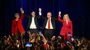 Australia's Prime Minister Anthony Albanese celebrates with his partner Jodie Haydon (R), son Nathan Albanese and Australia's Foreign Minister Penny Wong (L) after winning the general election at the Labor Party election night event in Sydney on May 3, 2025. (AFP Photo)