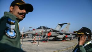 Indian Air Force (IAF) personnel stand in front of the Rafale fighter jet during Aero India 2025, in Bengaluru, India, Feb. 13, 2025. (AFP Photo)