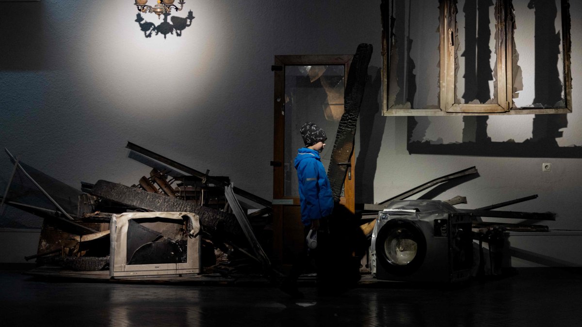 A child visits an exhibition on the Russia-Ukraine war at the National Museum of the History of Ukraine in World War II, Kyiv, Ukraine, May 2, 2025. (AFP Photo)