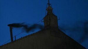 This photograph shows black smoke rising from the chimney of the Sistine Chapel signalling that cardinals failed to elect a new pope in the first ballot of their conclave in the Vatican, May 7, 2025. (AFP Photo)