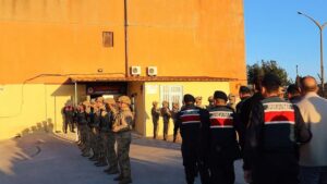 Gendarmerie forces bring arrested suspects to the Gendarmerie building following an organized crime operation, Çanakkale, Türkiye, May 3, 2025. (IHA Photo)
