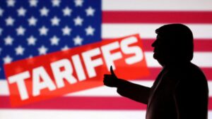 A 3D-printed miniature model depicting U.S. President Donald Trump, the U.S. flag and the word "Tariffs" in this illustration, April 17, 2025. (Reuters Photo)