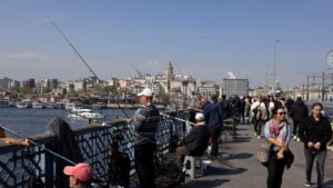 People fish from the Galata Bridge in Istanbul, Türkiye, April 25, 2025. (Reuters Photo)