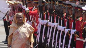 Bangladesh's Prime Minister Sheikh Hasina reviews an honor guard during a welcome ceremony at the government house, Bangkok, Thailand, April 26, 2024. (AP Photo)