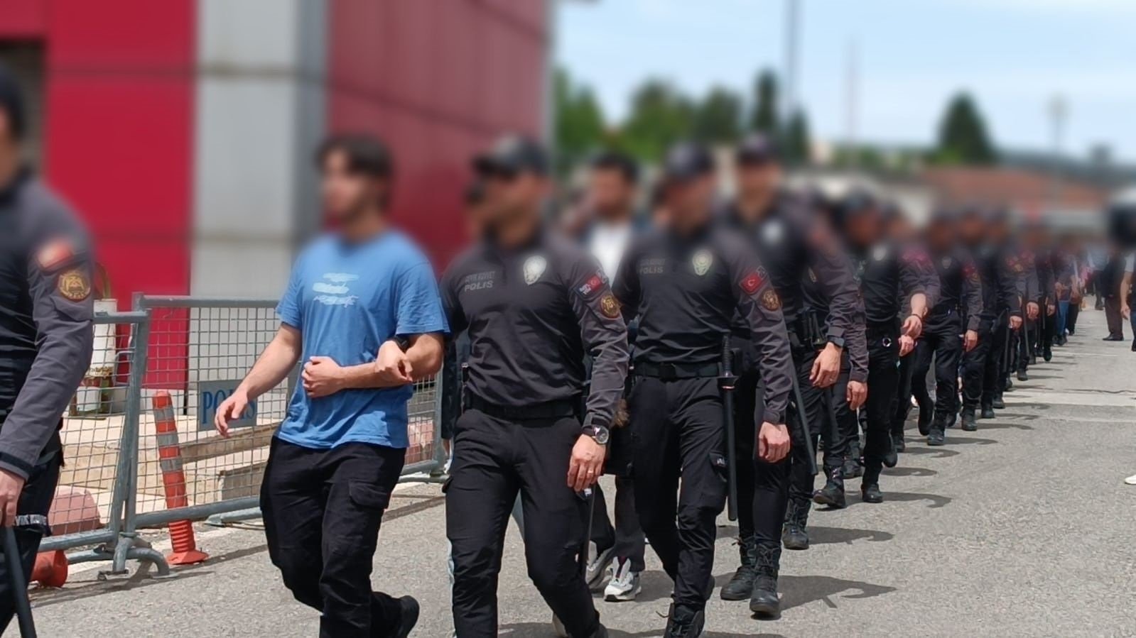 Security officials accompany detained suspects to the courthouse, Gaziantep, southern Türkiye, May 10, 2025. (DHA Photo)