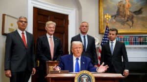 U.S. President Donald Trump gestures on the day he signs an executive order on prescription drug pricing, next to U.S. Health and Human Services (HHS) Secretary Robert F. Kennedy, Jr., during a press conference in the Roosevelt Room at the White House in Washington, D.C., U.S., May 12, 2025. (Reuters Photo)