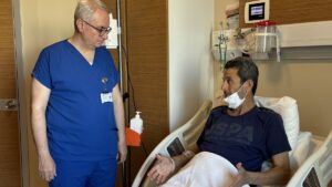 Ersin Şimşek, 47, speaks with his doctor following a liver transplant, Antalya, southern Türkiye, May 12, 2025. (AA Photo)