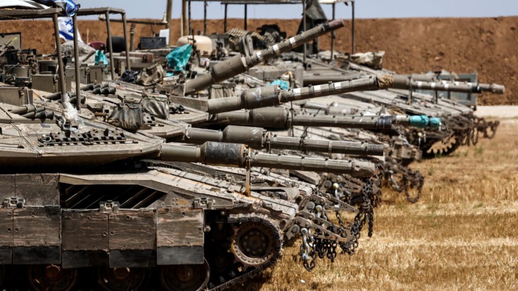 Israeli tanks stand near the border between Israel and the Gaza Strip, as seen from the Israeli side of the border, May 13, 2025. (Reuters Photo)