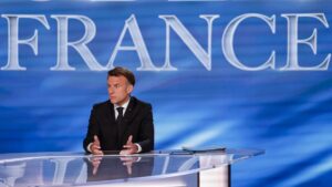 President Emmanuel Macron gestures on the set during his guest appearance on a special program of the French channel TF1 in Saint-Denis, France, May 13, 2025. (EPA Photo)
